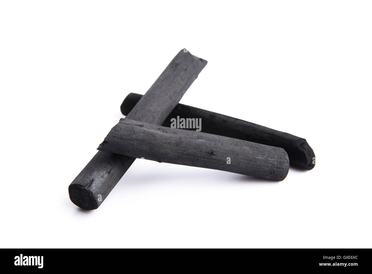 Artist's black charcoal isolated on white Stock Photo Alamy