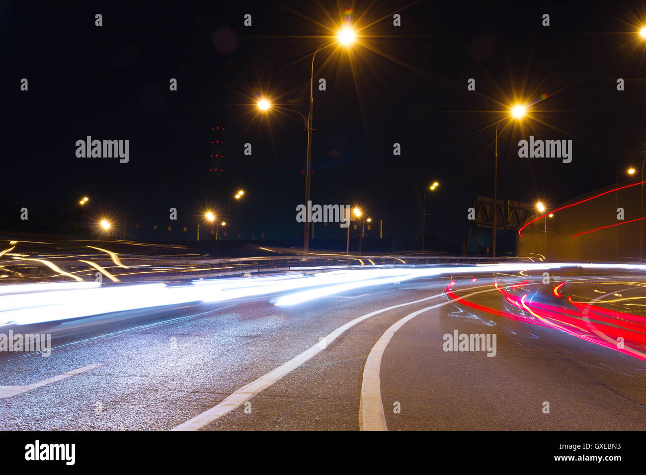 Abstract urban background with night traffic light pattern. Stock Photo