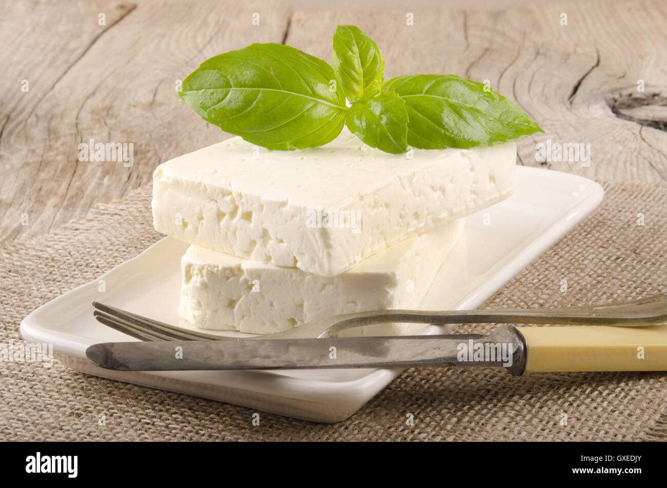 greek goat cheese and basil Stock Photo Alamy