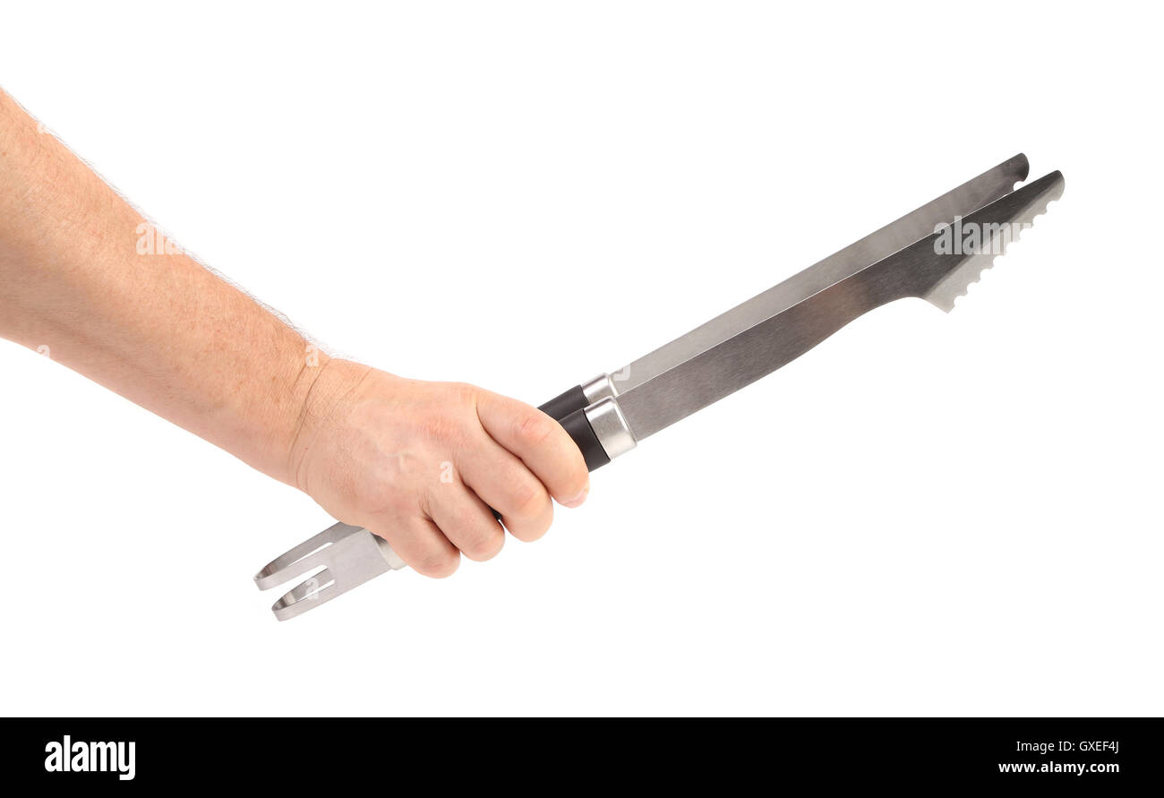 Hand holding bbq tongs Stock Photo Alamy