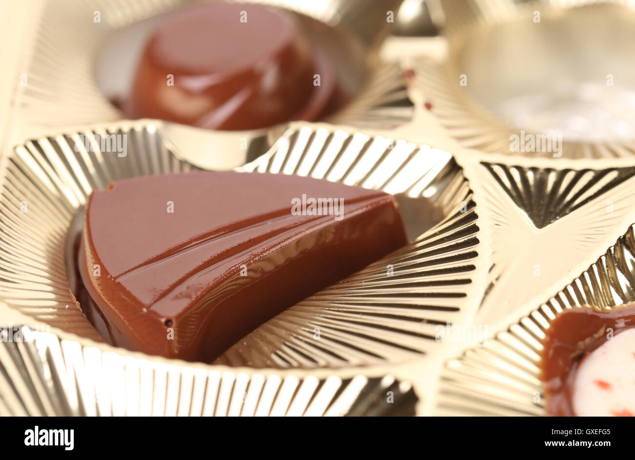Background of box with chocolates Stock Photo - Alamy