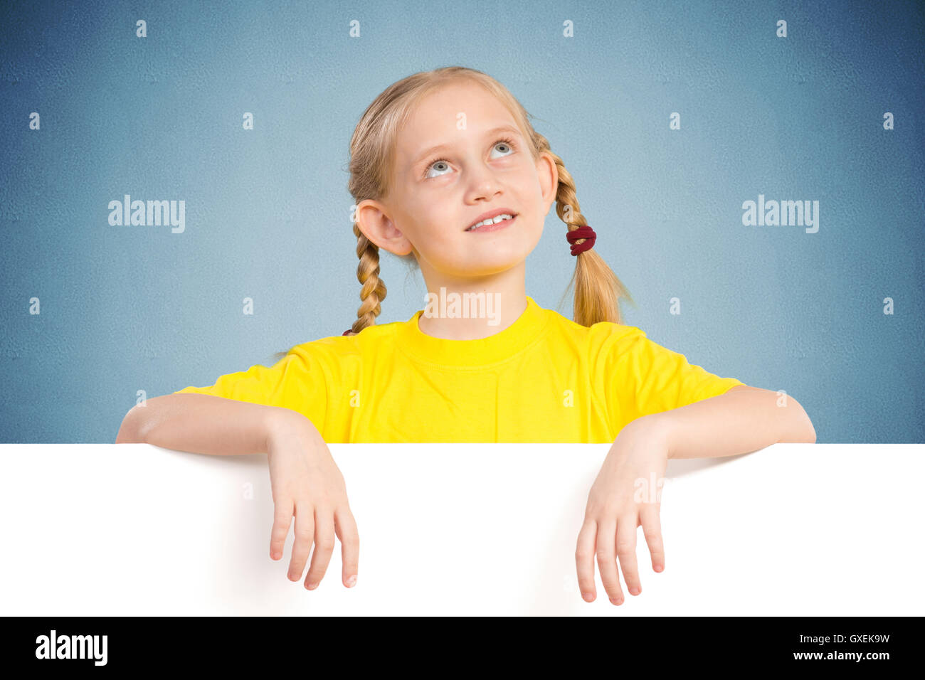 girl holding a white banner Stock Photo