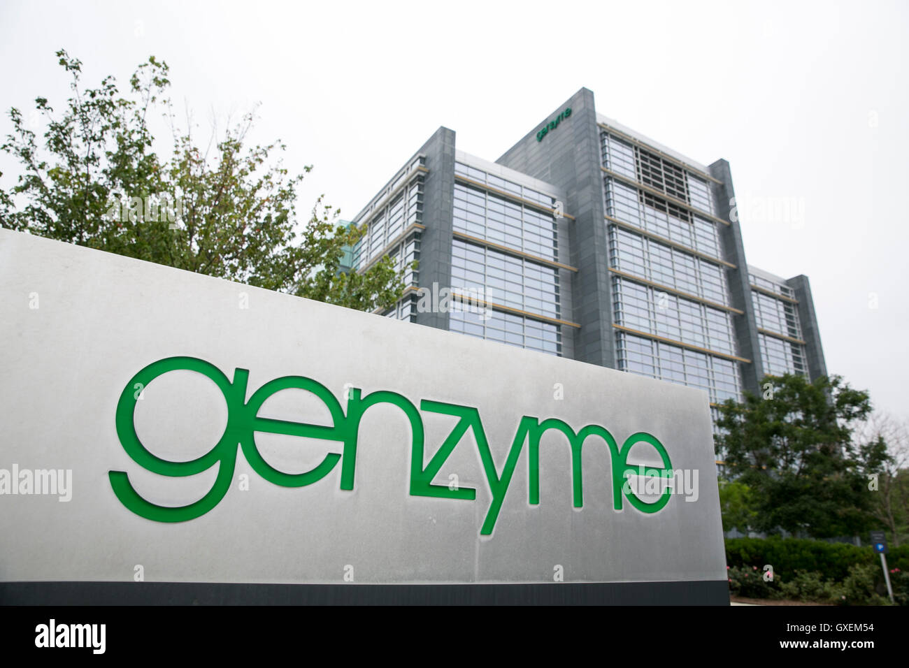 A logo sign outside of a facility occupied by the Genzyme Corporation