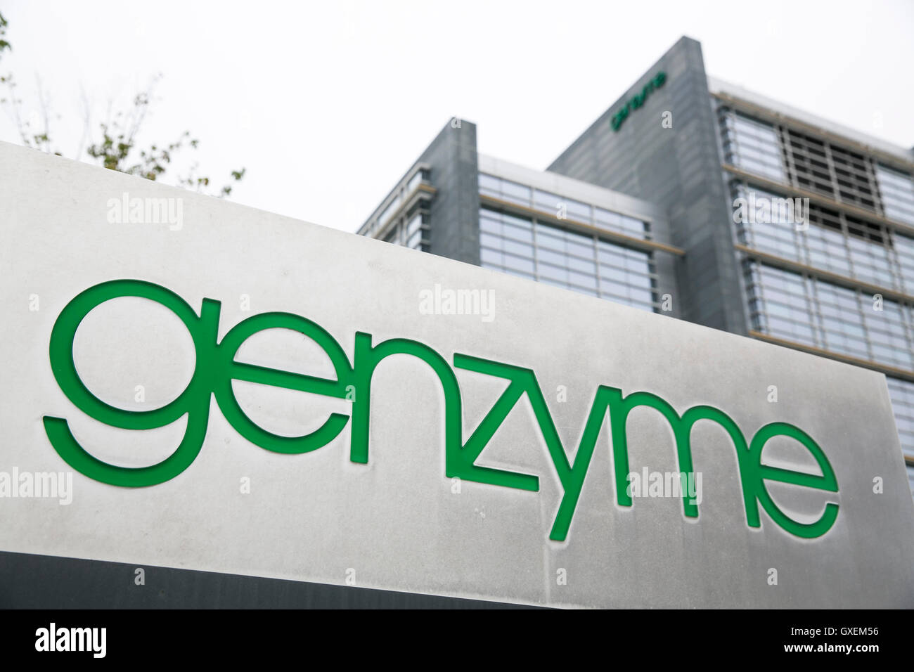 A logo sign outside of a facility occupied by the Genzyme Corporation
