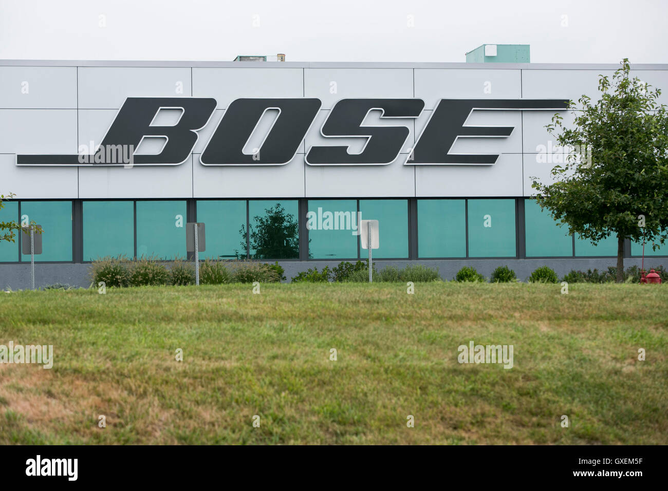 A logo sign outside of the headquarters of the Bose Corporation in Framingham, Massachusetts on August 13, 2016. Stock Photo