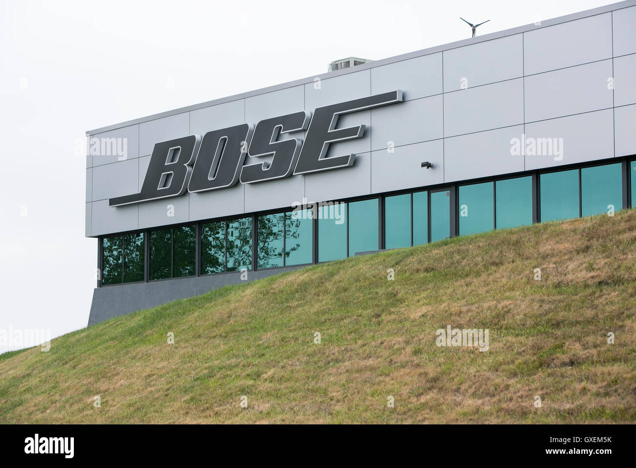 A logo sign outside of the headquarters of the Bose Corporation in Framingham, Massachusetts on August 13, 2016. Stock Photo