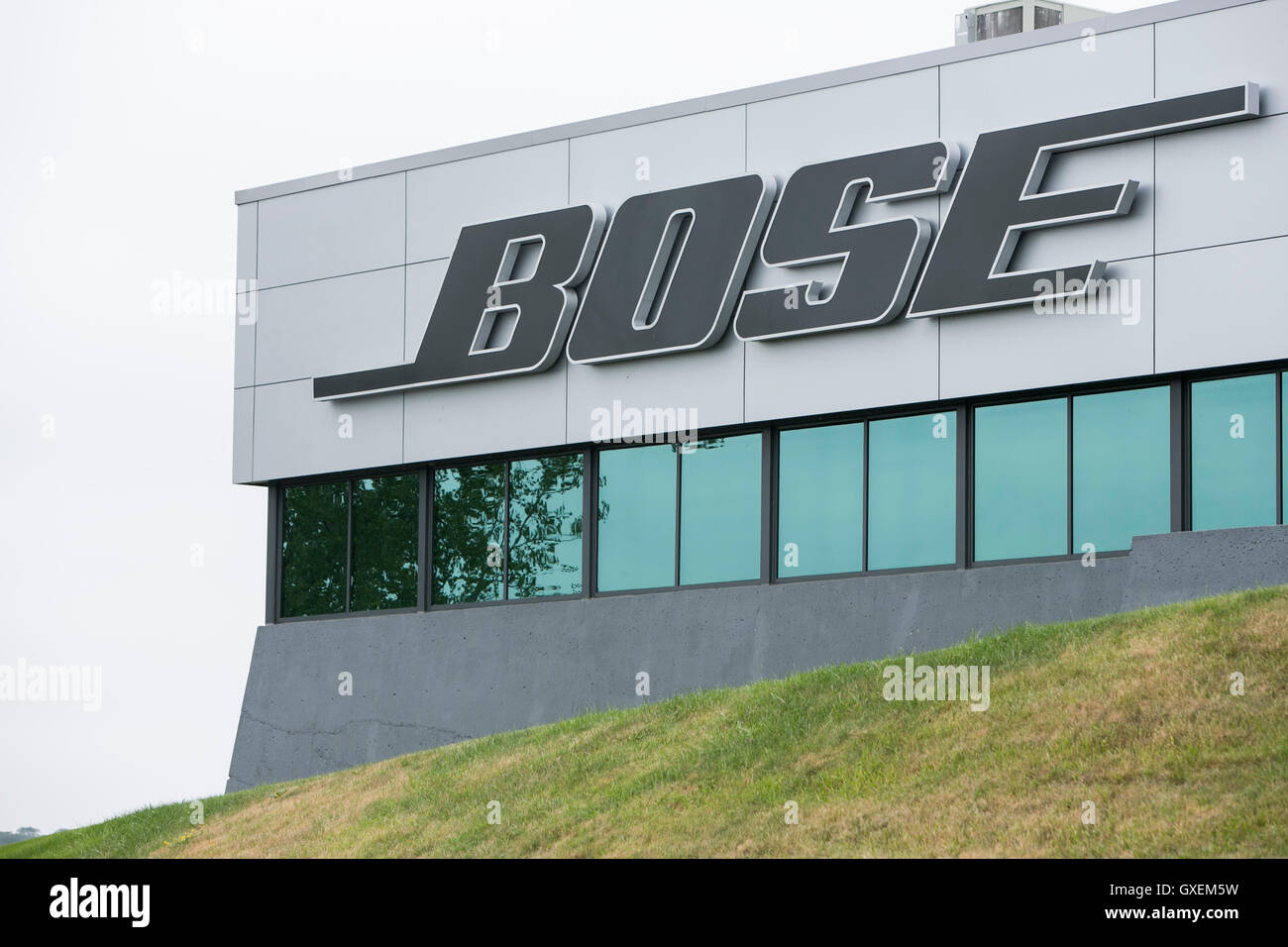 A logo sign outside of the headquarters of the Bose Corporation in Framingham, Massachusetts on August 13, 2016. Stock Photo