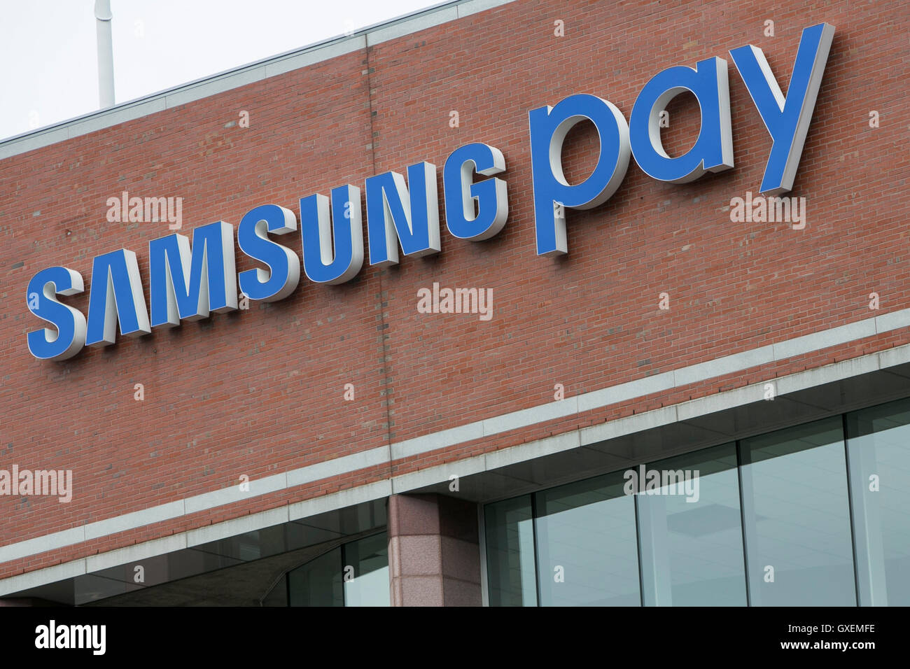 A logo sign outside of the headquarters of Samsung Pay in Burlington, Massachusetts on August 13, 2016. Stock Photo