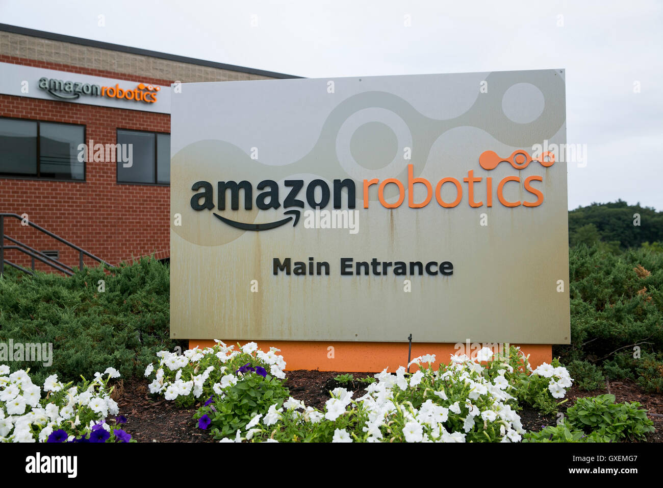 A logo sign outside of a facility occupied by Amazon Robotics in North Reading, Massachusetts on August 13, 2016. Stock Photo