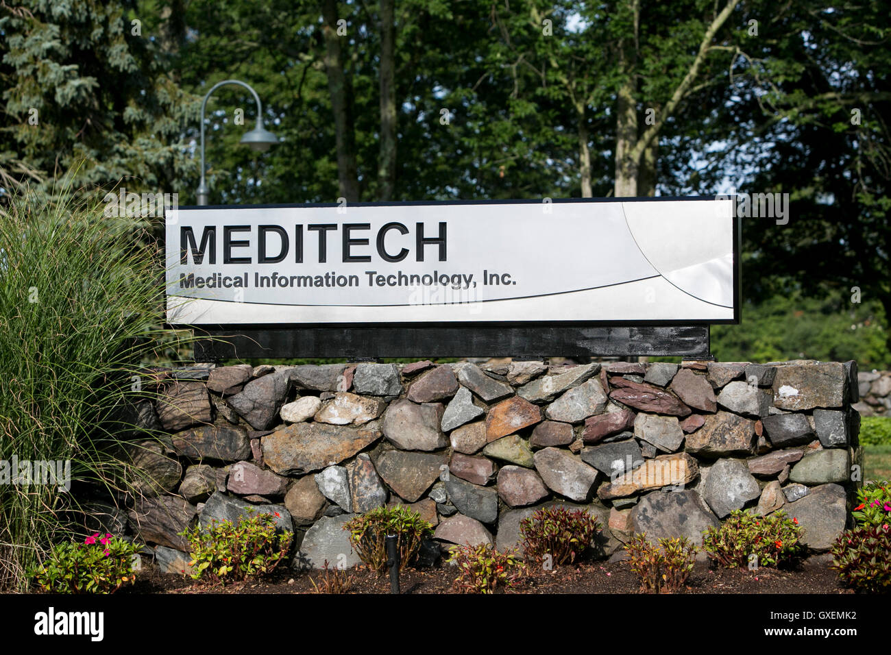 A logo sign outside of a facility occupied by Medical Information Technology, Inc., also known as Meditech, in Canton, Massachus Stock Photo