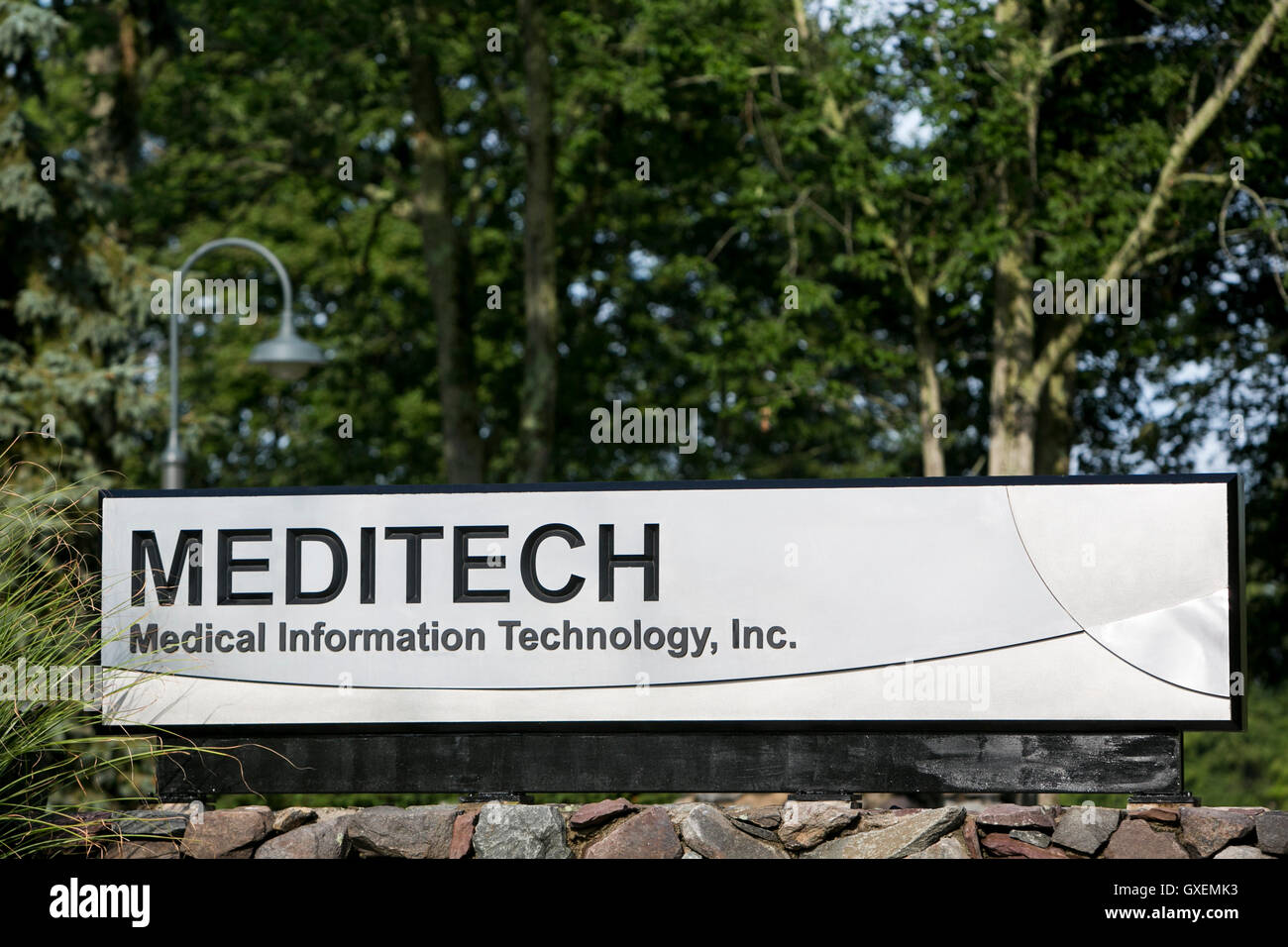 A logo sign outside of a facility occupied by Medical Information Technology, Inc., also known as Meditech, in Canton, Massachus Stock Photo