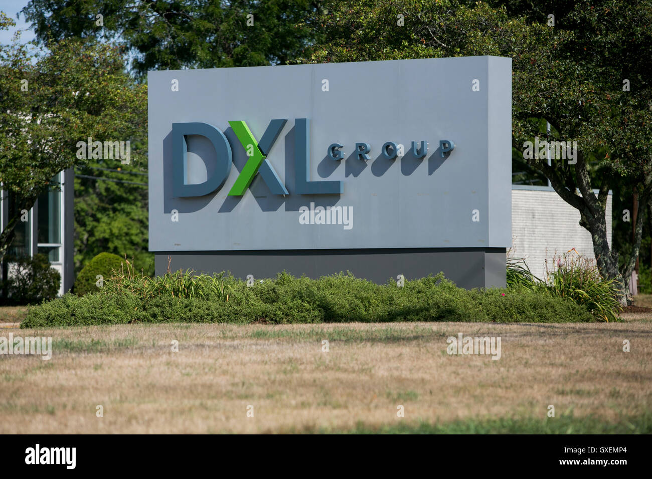 A logo sign outside of the headquarters of Destination XL Group, Inc., in Canton, Massachusetts on August 14, 2016. Stock Photo