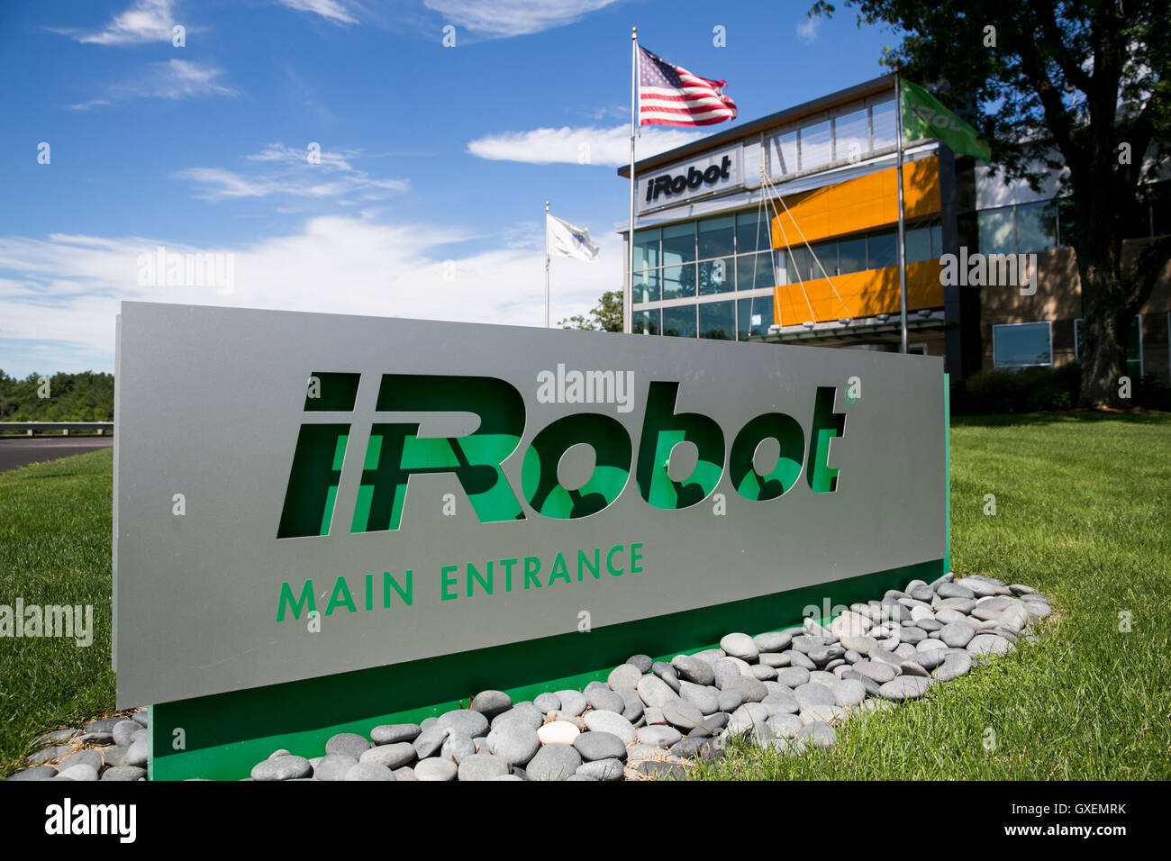 A logo sign outside of the headquarters of the iRobot Corporation in  Bedford, Massachusetts on August 14, 2016 Stock Photo - Alamy