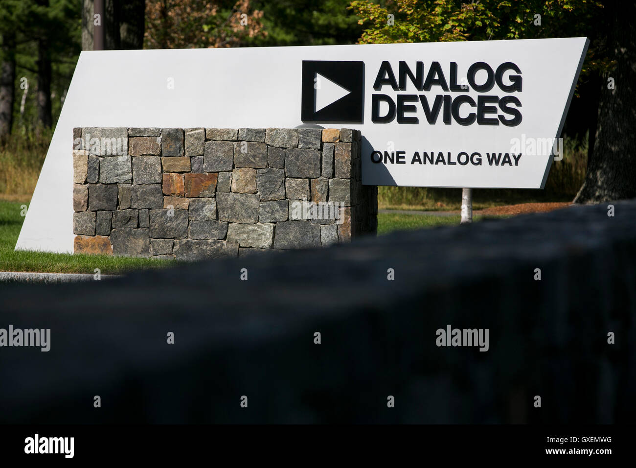 A logo sign outside of the headquarters of Analog Devices, Inc., in Norwood, Massachusetts on August 14, 2016. Stock Photo