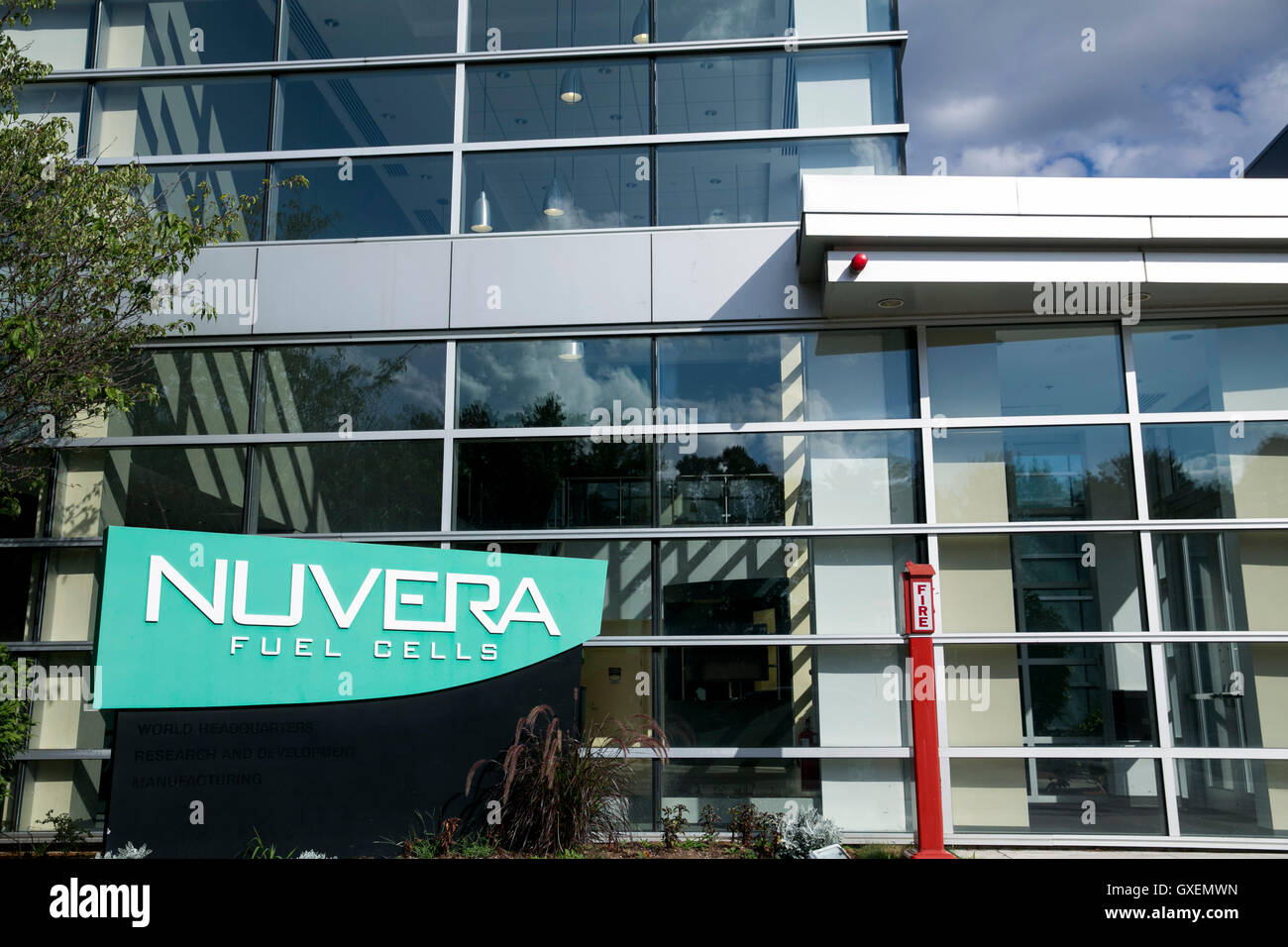 A logo sign outside of the headquarters of Nuvera Fuel Cells in
