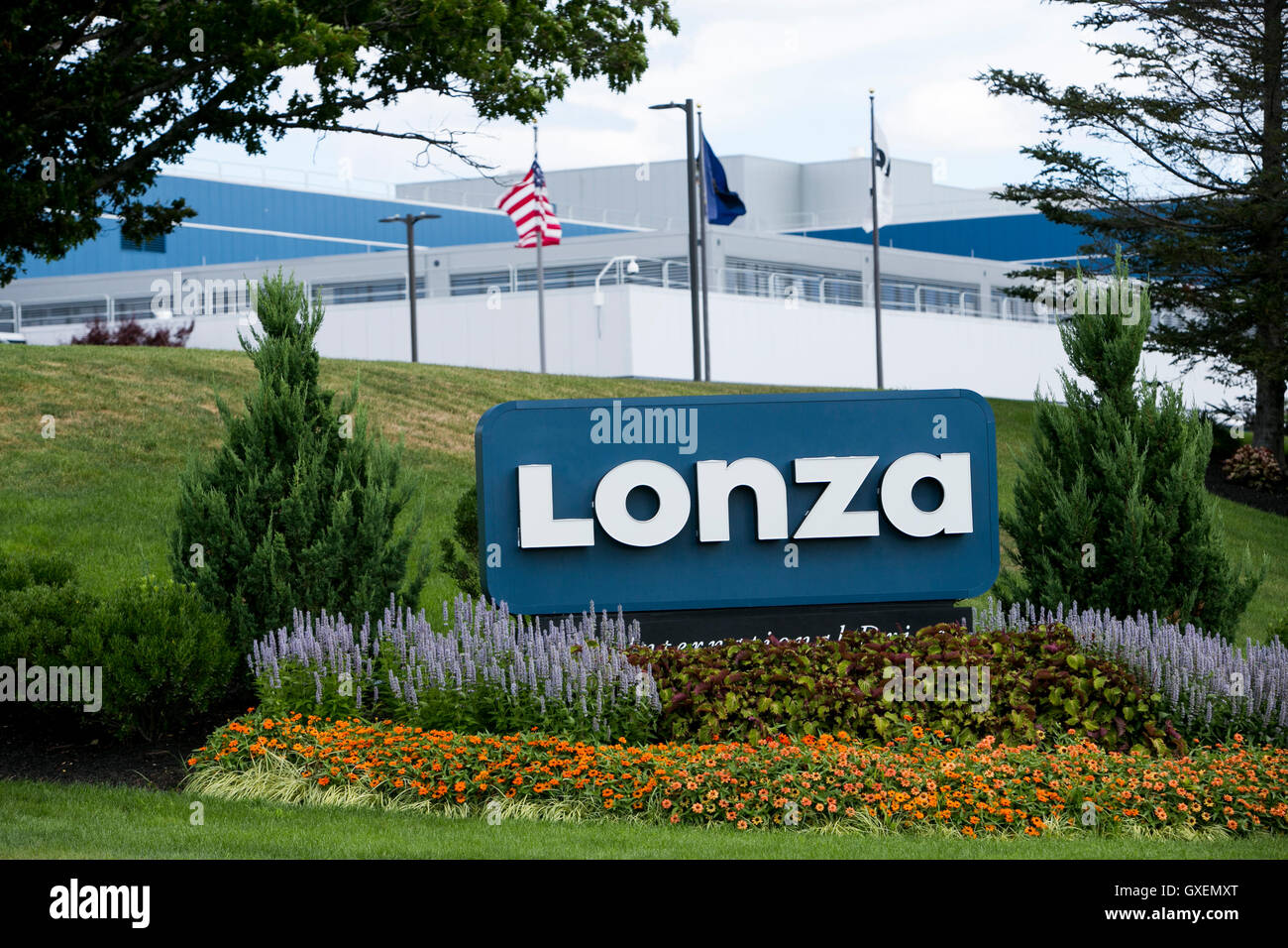 A logo sign outside of a facility occupied by the Lonza ...