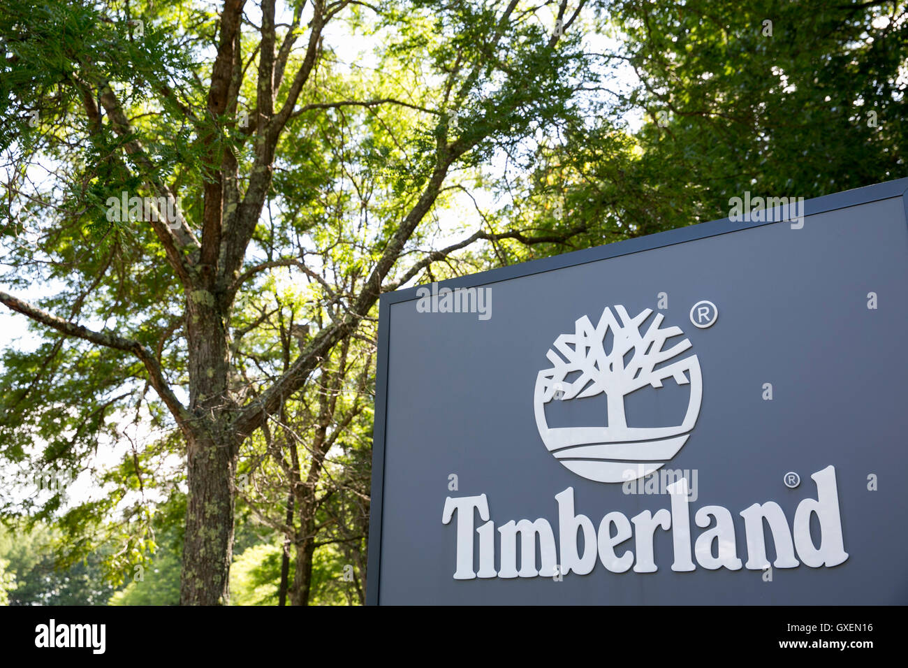 A logo sign outside of the headquarters of The Timberland Company in