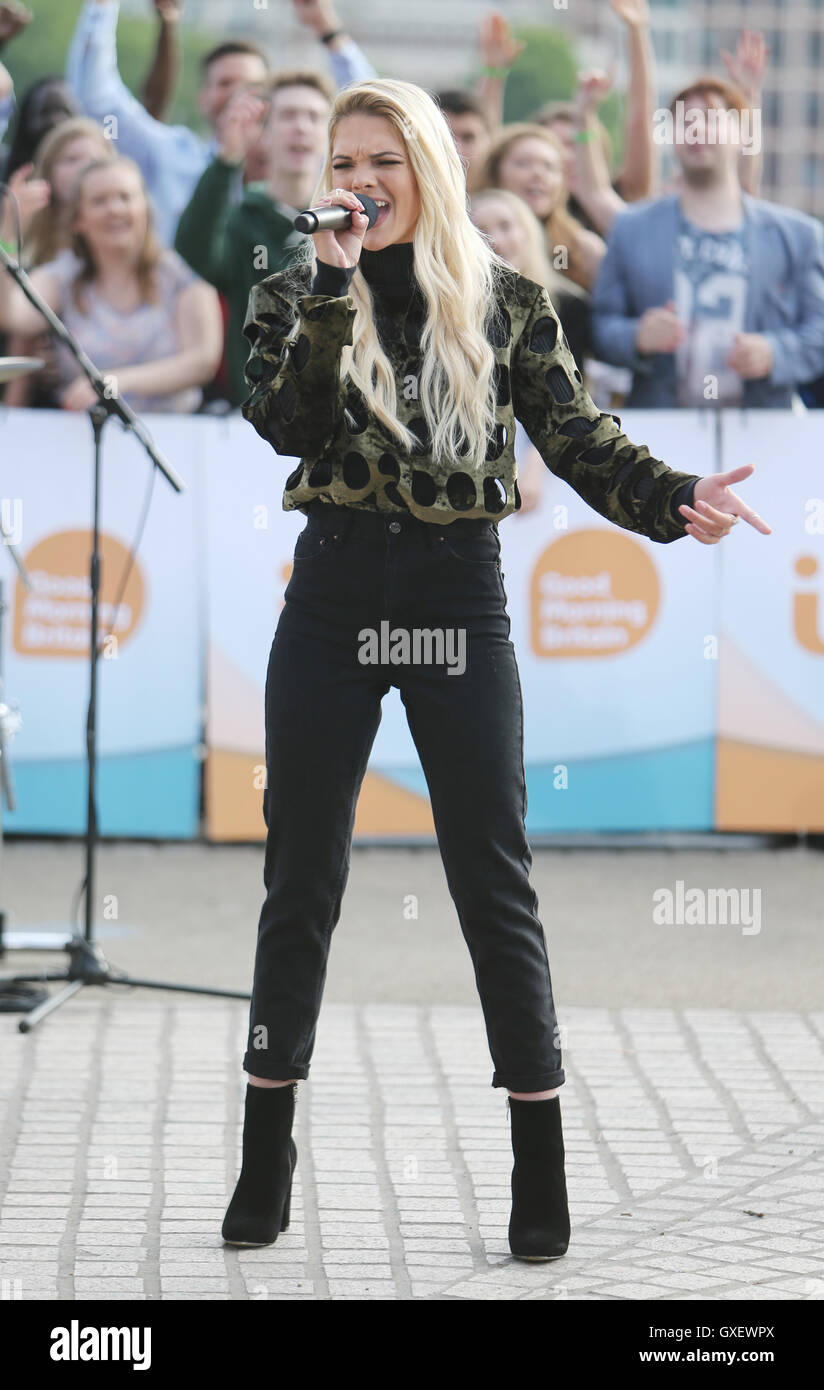 Louisa Johnson singing with Clean Bandit outside ITV Studios Featuring