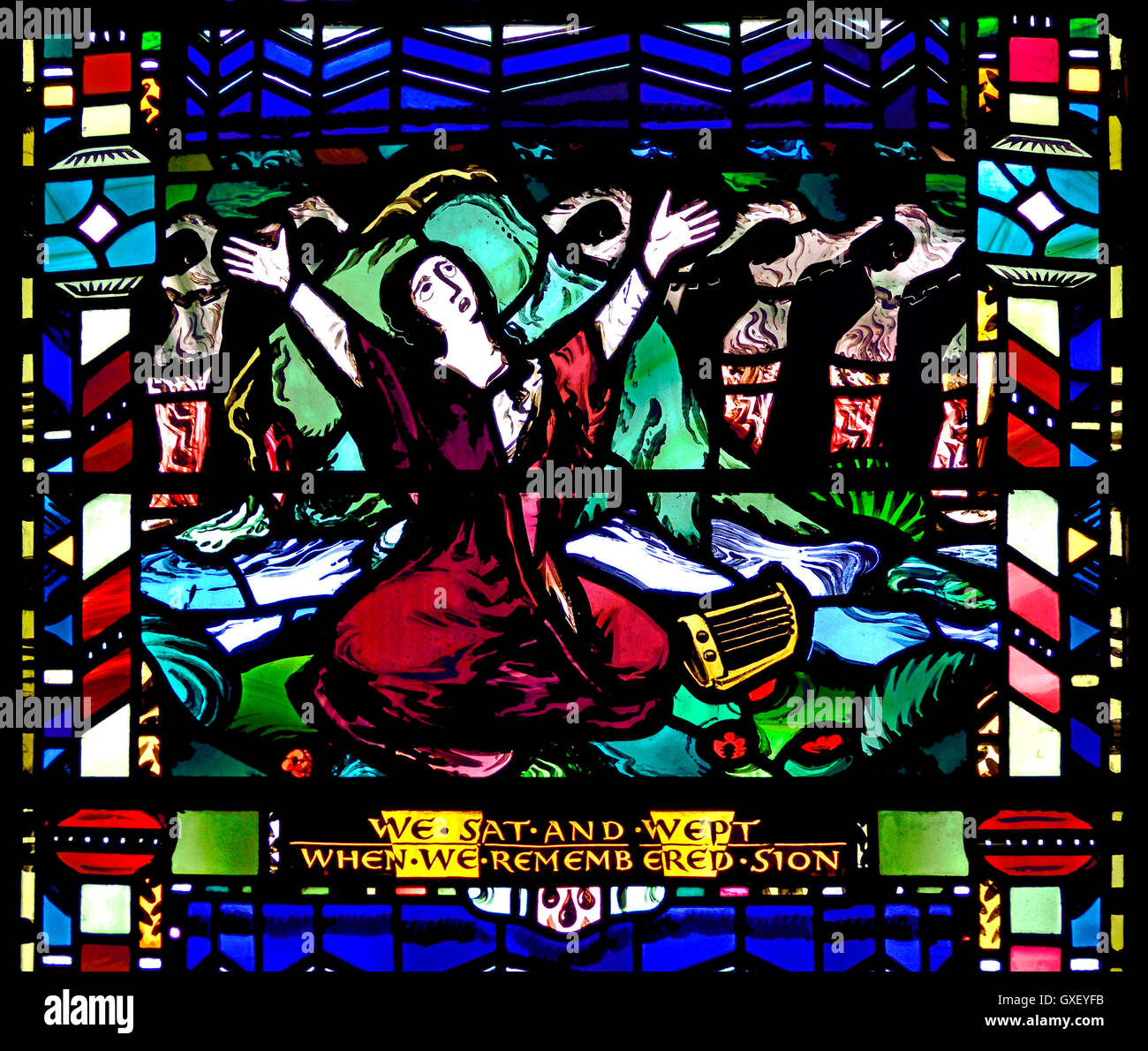 London, England, UK. St Etheldreda's Church in Ely Place. Stained glass window: Bible scene. Psalms 137:1 Stock Photo