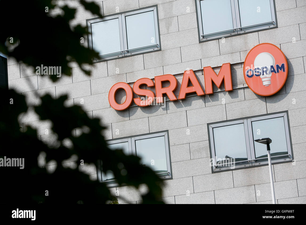 A logo sign outside of facility occupied by Osram in Milan, Italy on September 3, 2016. Stock Photo