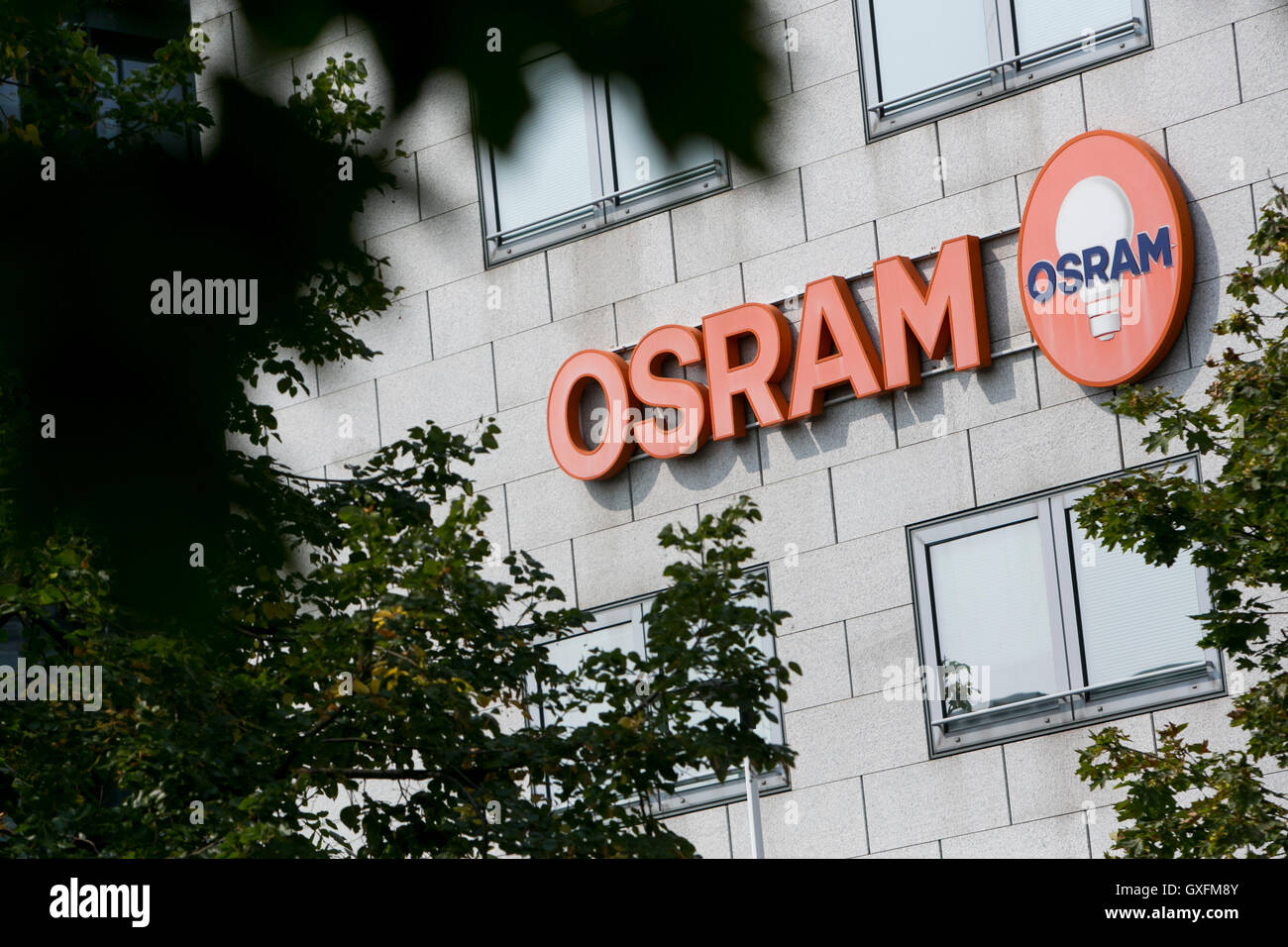 A logo sign outside of facility occupied by Osram in Milan, Italy on September 3, 2016. Stock Photo