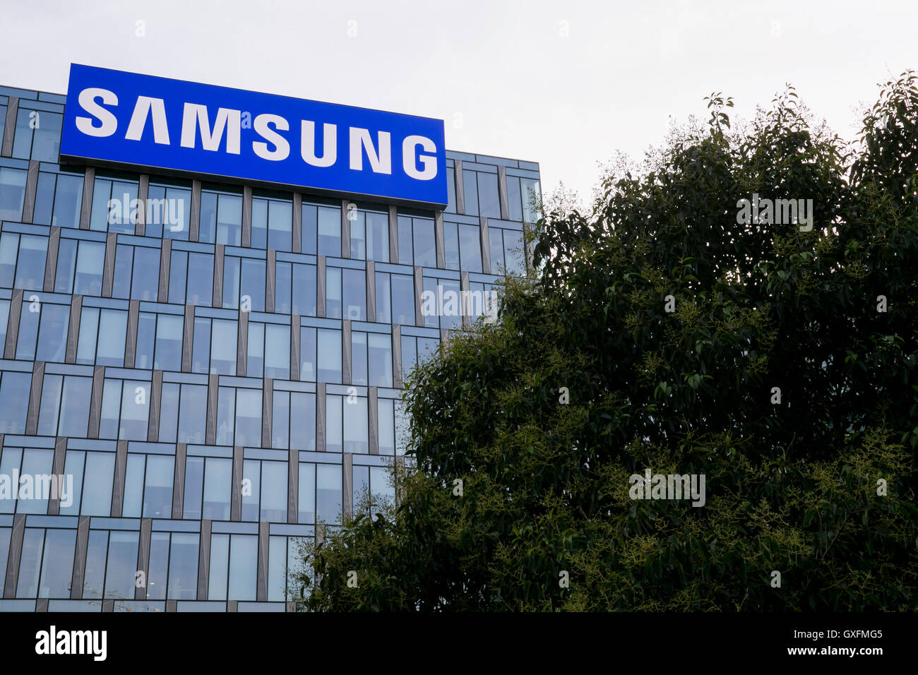 A logo sign outside of a facility occupied by the Samsung Group in Milan, Italy on September 3, 2016. Stock Photo