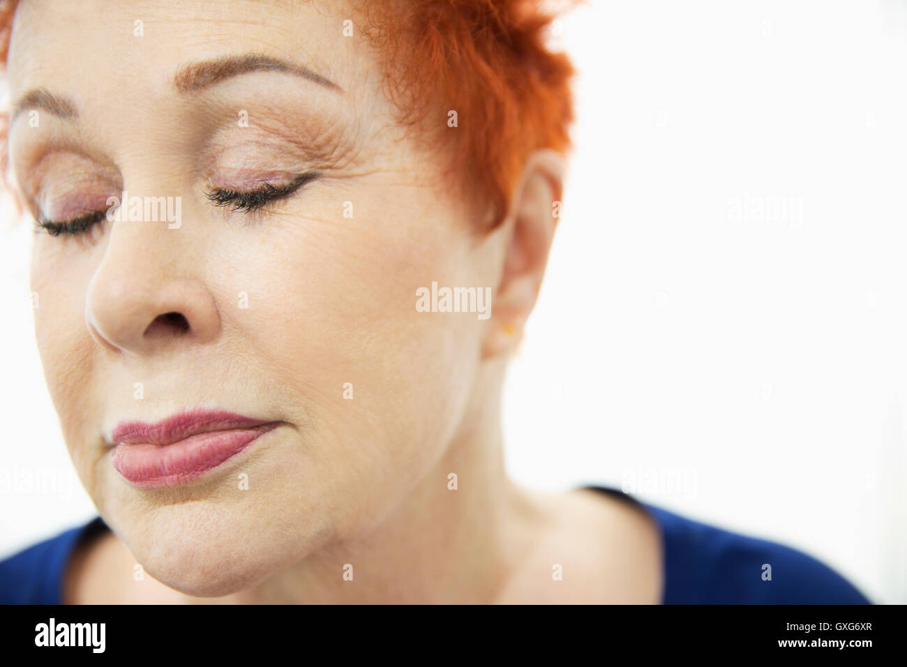 Face of older Caucasian woman with eyes closed Stock Photo - Alamy