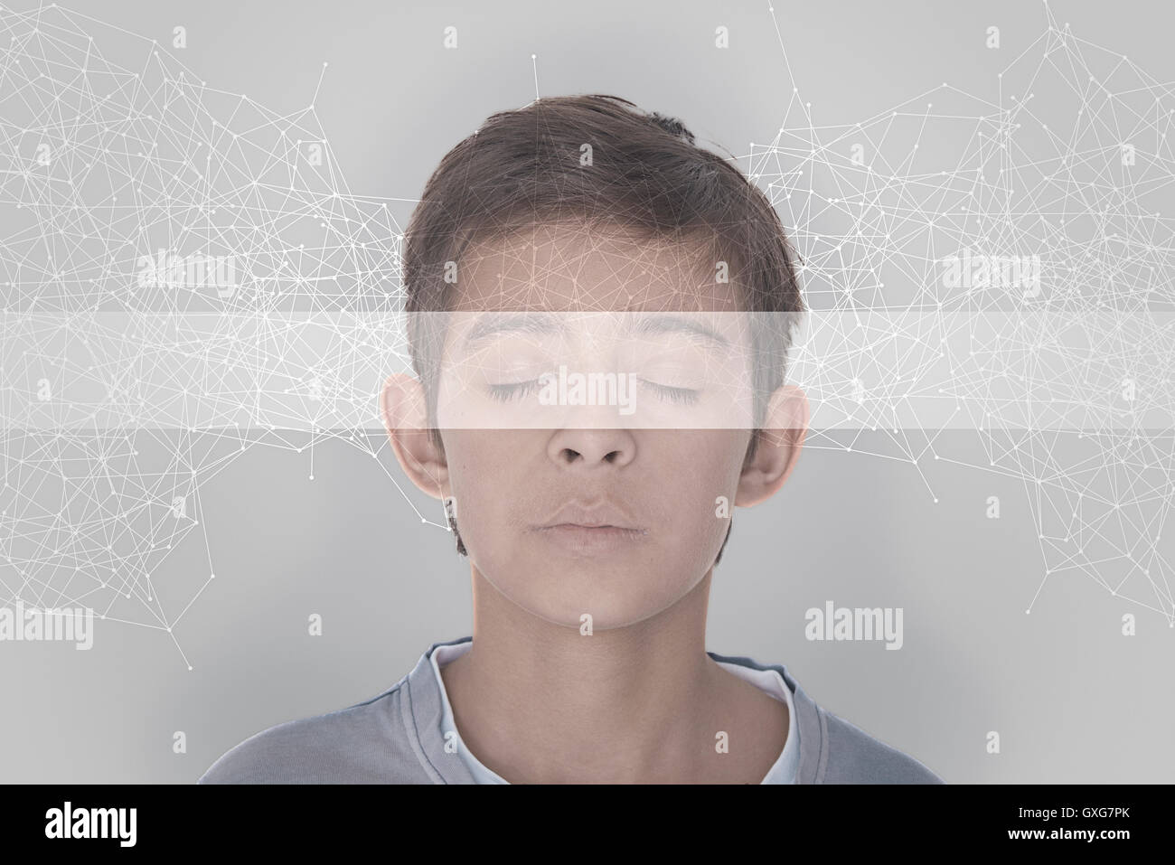 Mixed Race boy sensing virtual network Stock Photo