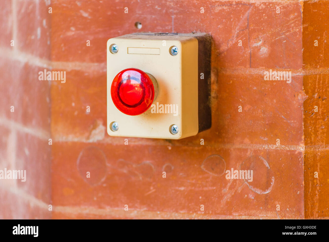 Emergency door release red button with light on Stock Photo