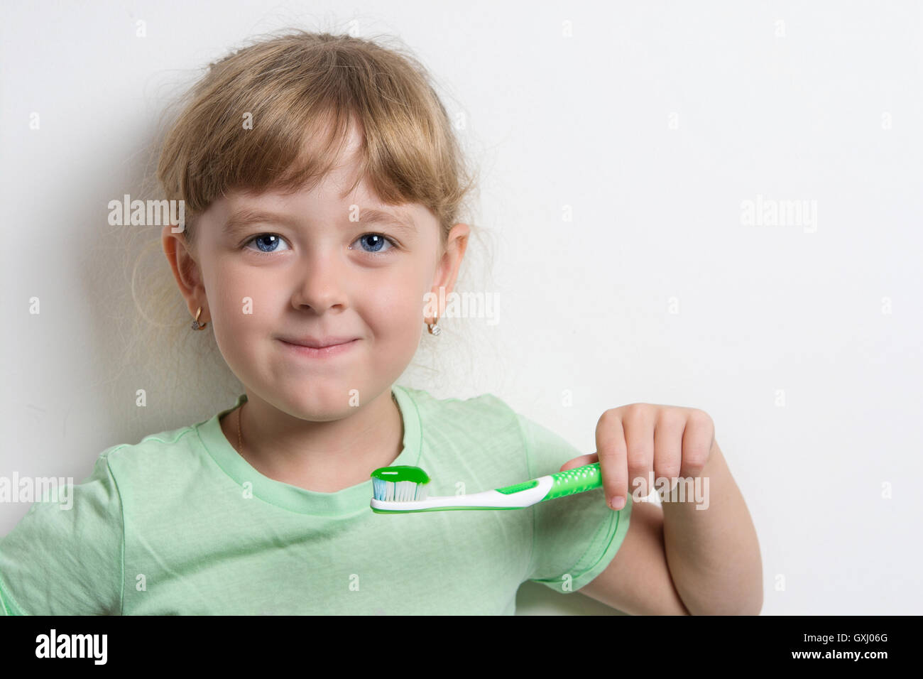 baby brushing her teeth Stock Photo Alamy