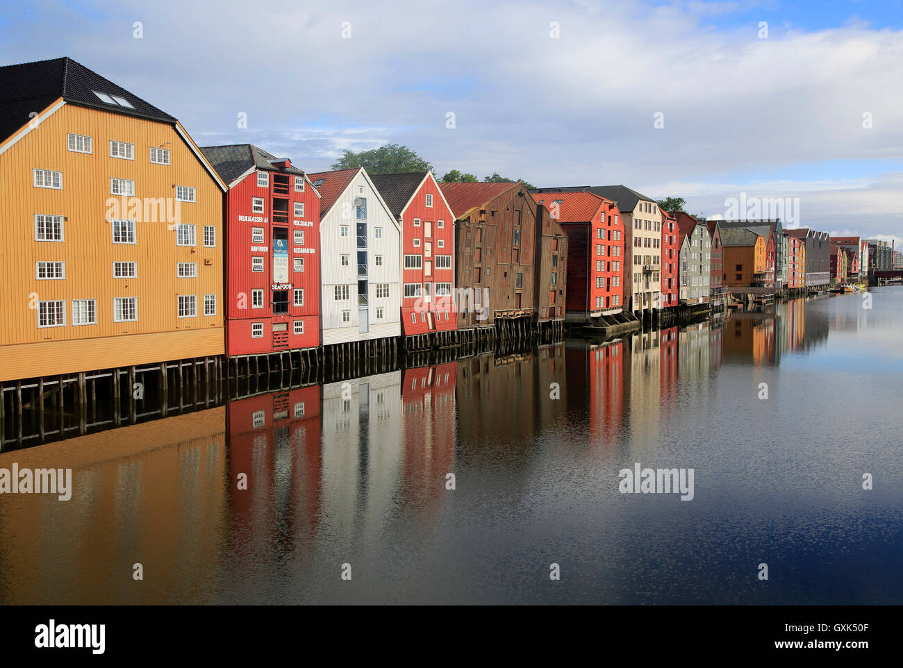 Historic waterside warehouse buildings on River Nidelva, Bryggene, Trondheim, Norway Stock Photo
