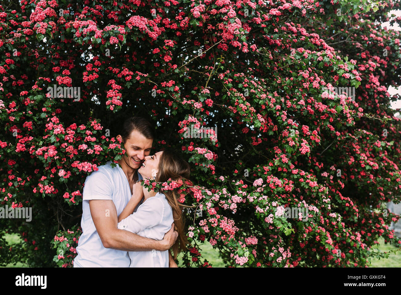 Young happy couple in love outdoors Stock Photo - Alamy