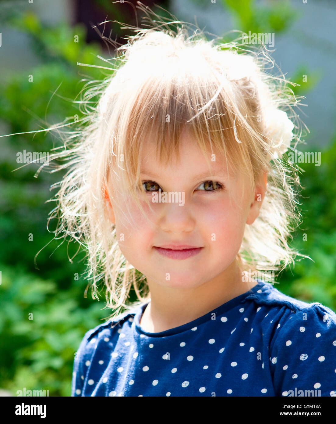 Portrait of a Beautiful Little Girl with Blond Hair Stock Photo - Alamy