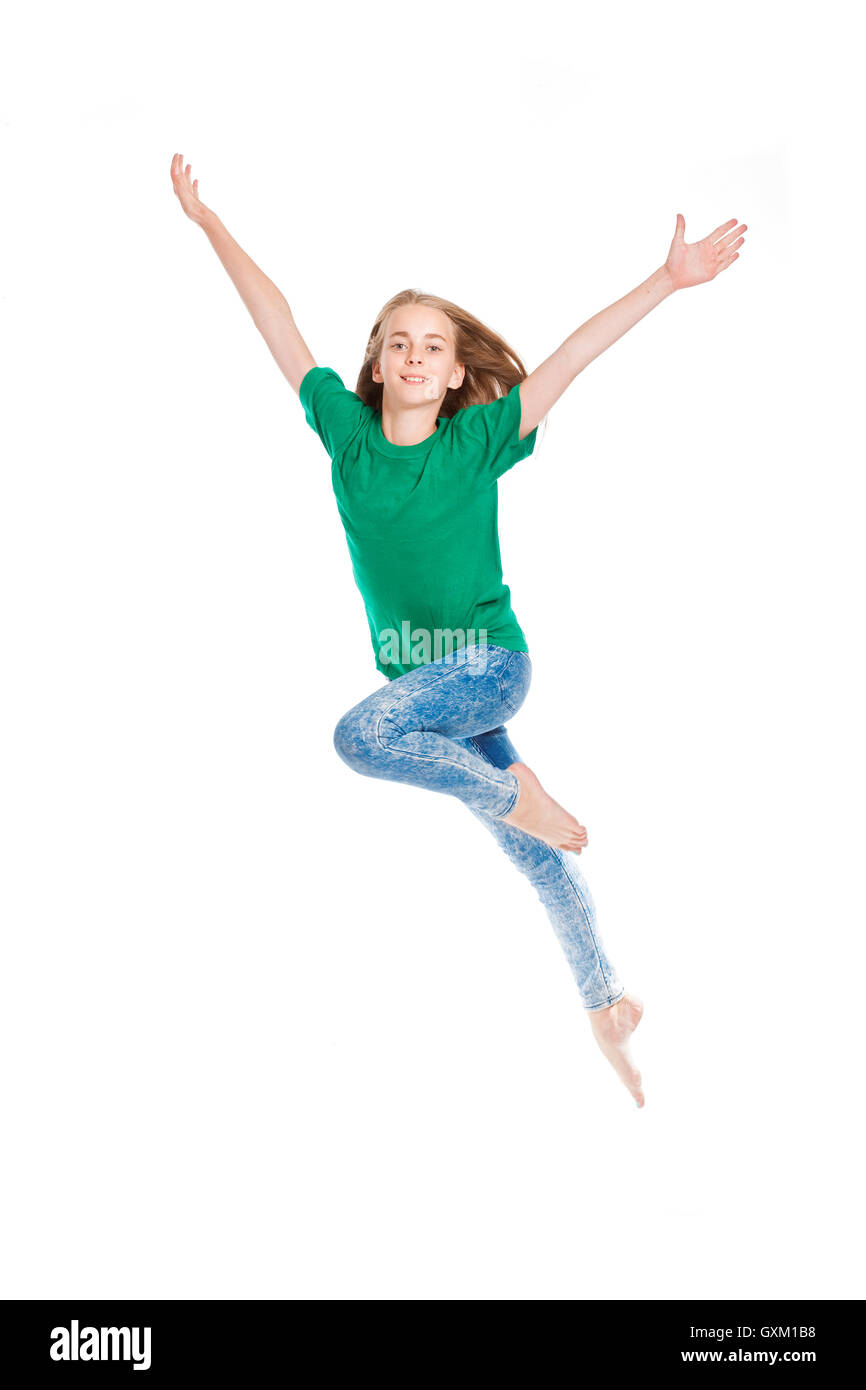 Young Girl with Blond Hair Jumping in the Air Stock Photo