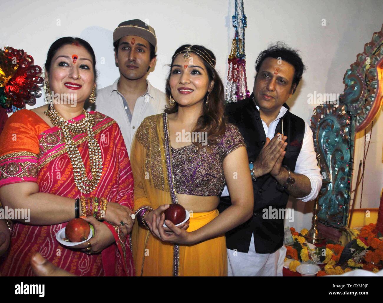 Bollywood actor Govinda Sunita Ahuja, daughter Tina Ahuja and son Yashvardan Ahuja Ganesh Chaturthi celebrations Mumbai Stock Photo