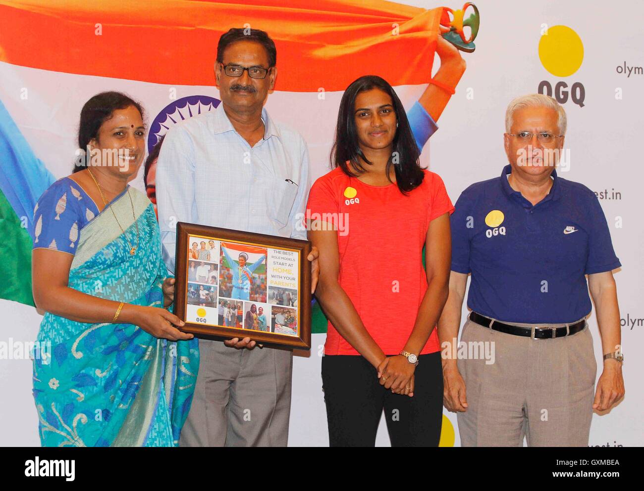 Indian badminton player silver medallist P V Sindhu parents PV Ramana P Vijaya felicitation function organised OGQ Mumbai Stock Photo