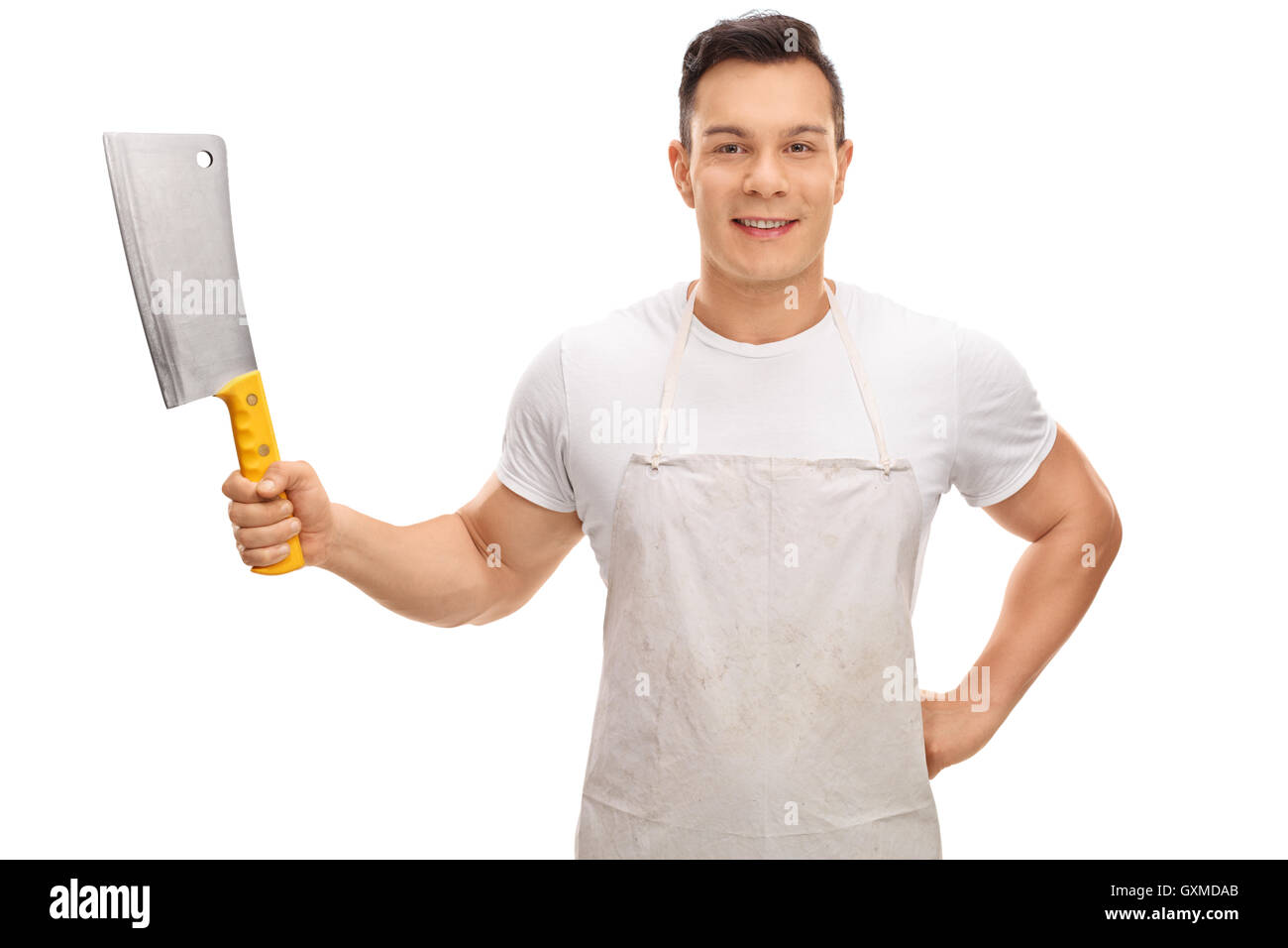 Young butcher holding a cleaver isolated on white background Stock