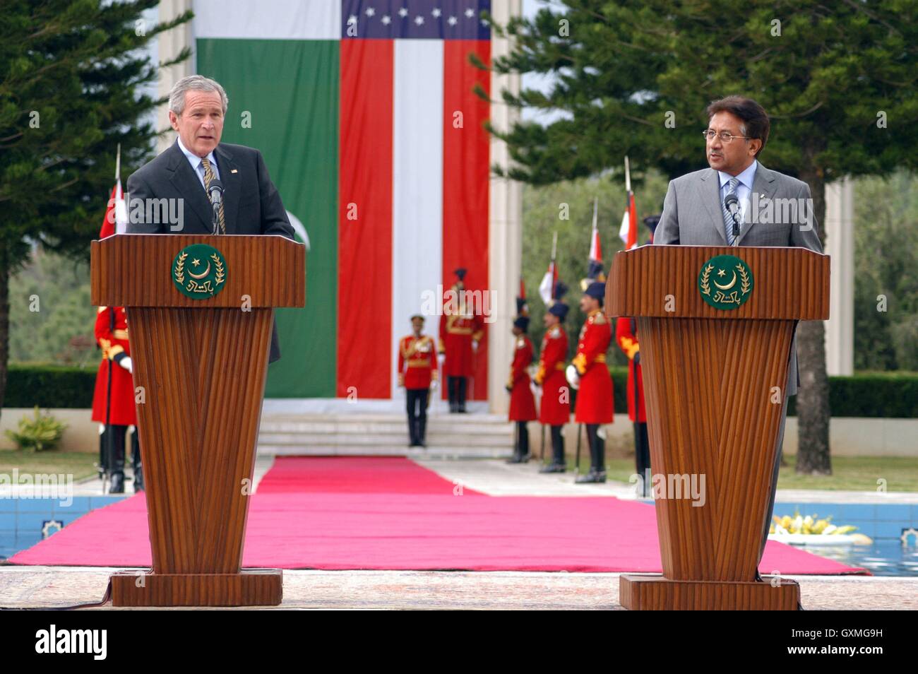 U.S. President George W. Bush speaks during a joint press conference with Pakistan President Pervez Musharraf at the official presidential residence the Aiwan-e-Sadr March 4, 2006 in Islamabad, Pakistan. Stock Photo