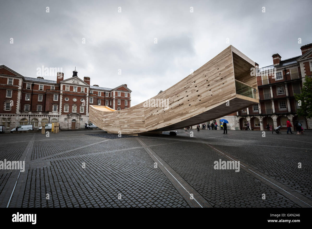 London, UK. 16th September, 2016. 'The Smile' is the world's first mega tube made from wood. A massive hardwood structure constructed from American tulipwood, designed by Alison Brooks Architects and engineered by wood building expert Andrew Lawrence from Arup. The Smile is displayed outside Chelsea Art College as part of the London Design Festival Credit:  Guy Corbishley/Alamy Live News Stock Photo
