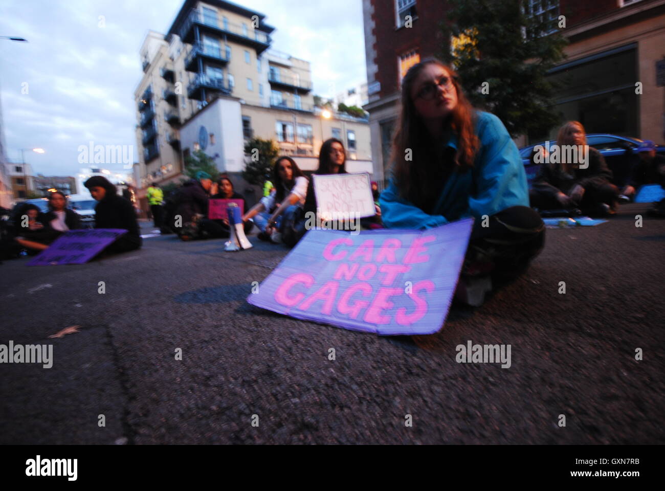 sit down sisters uncut protesting the service supplier G4s, over the running down of prison services. Stock Photo