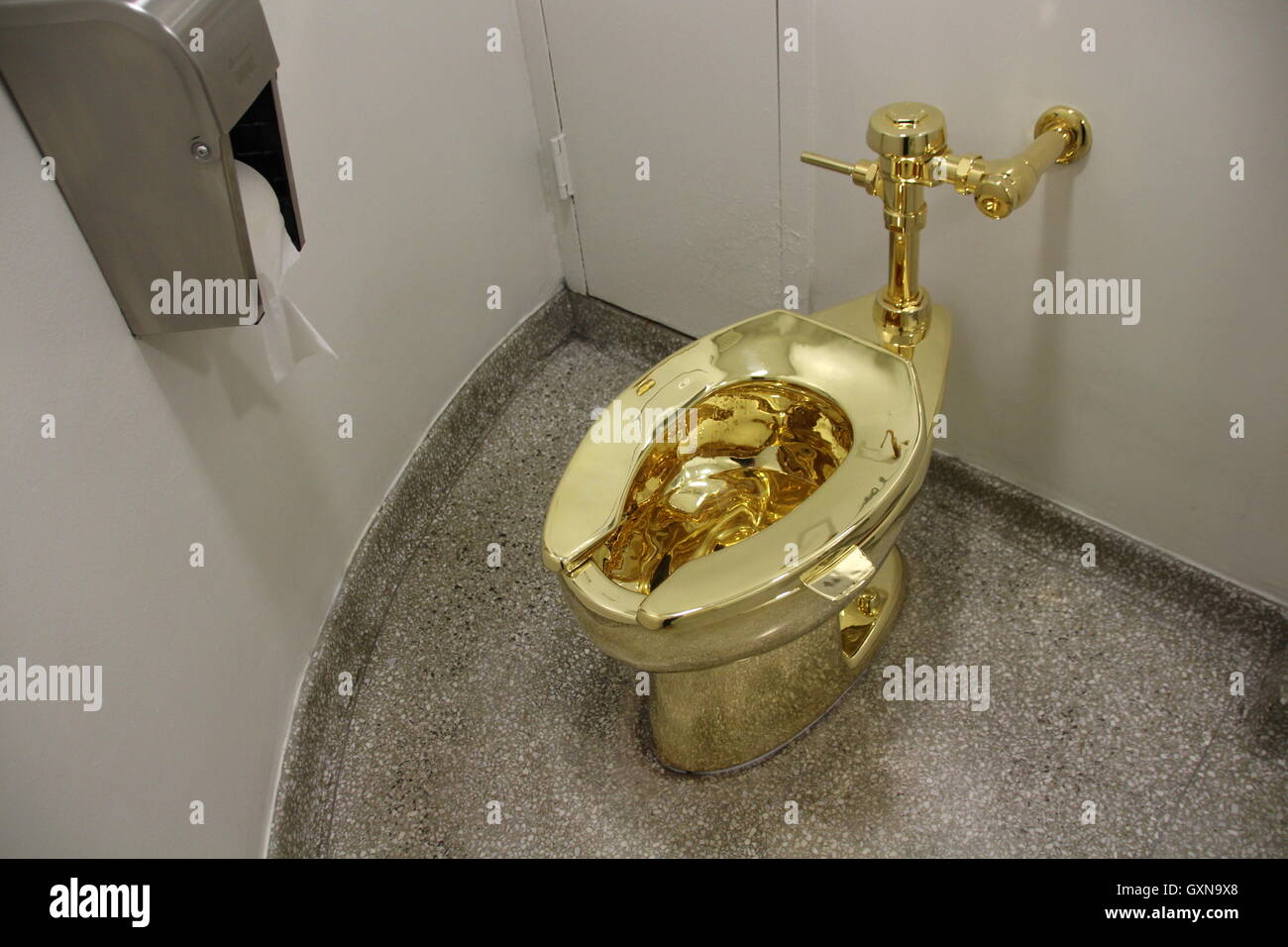 Manhattan, New York City, USA. 16th Sep, 2016. The fully functional 'America' toilet made from 18-karat gold has been opened in the Guggenheim Museum in Manhattan, New York City, USA, 16 September 2016. The toilet can and is to be used, but was also designed to be an artwork by Italian artist Maurizio Cattelan. Photo: CHRISTINA HORSTEN/dpa/Alamy Live News Stock Photo