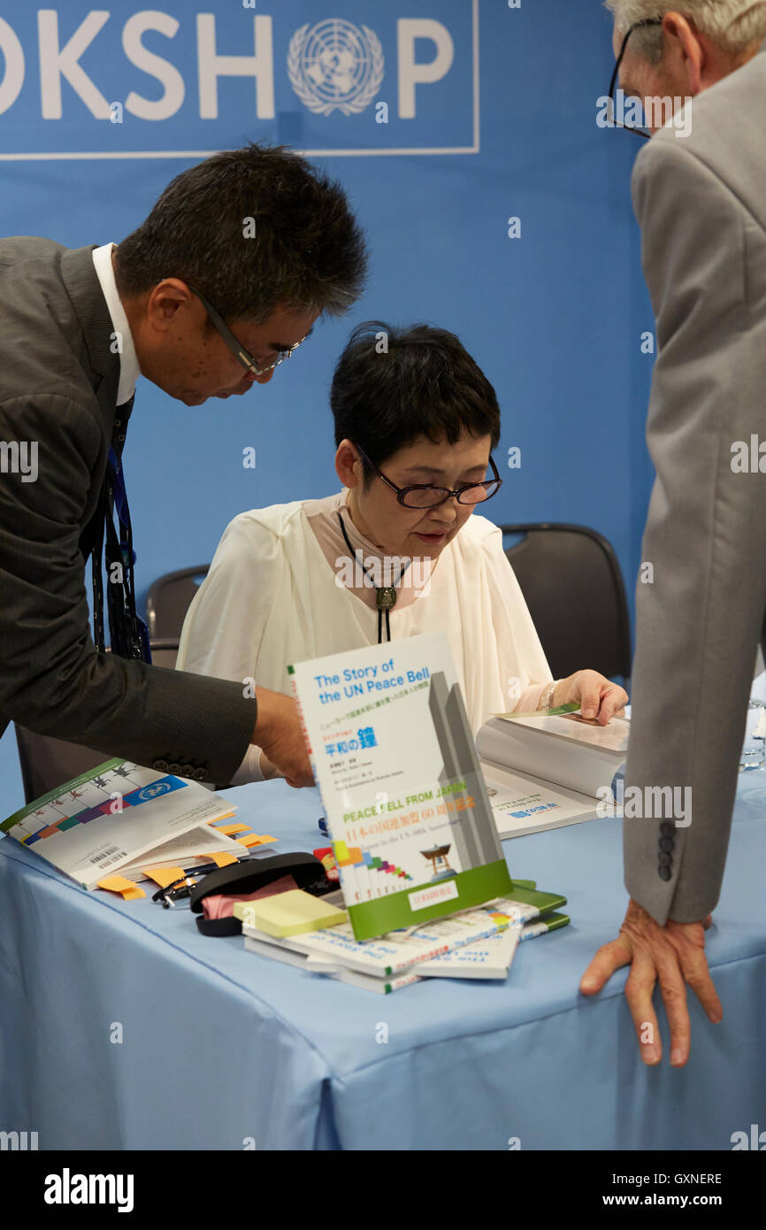Author Seiko Takase, signs books and greeted guest at the UN Book Store on the International Day of Peace. Seiko Takase shares with us her father Chiyoji Nakagawa project known as the “Peace Bell” on the 35th Anniversary of the International Day of Peace. Stock Photo