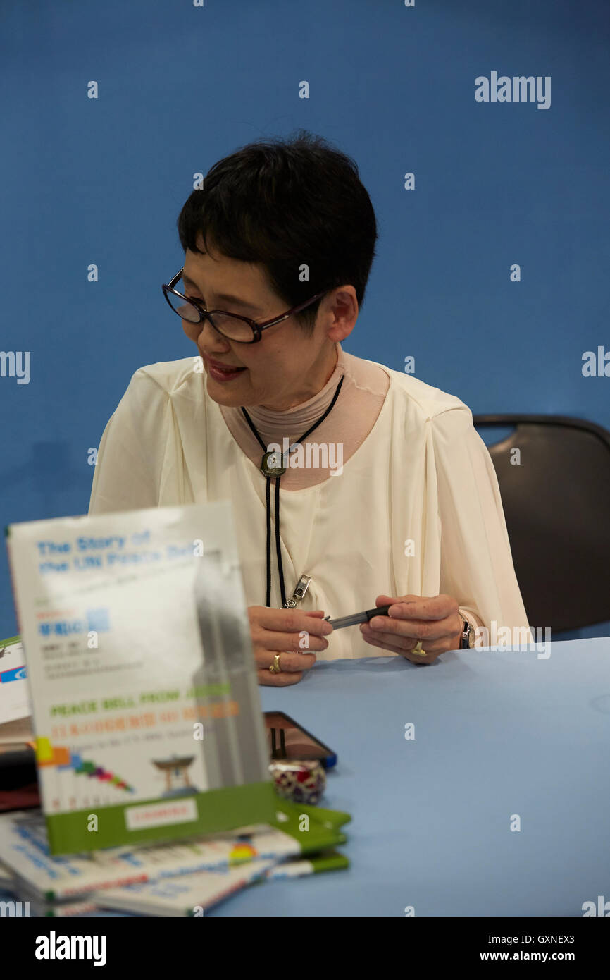 Author Seiko Takase, signs books and greeted guest at the UN Book Store on the International Day of Peace. Seiko Takase shares with us her father Chiyoji Nakagawa project known as the “Peace Bell” on the 35th Anniversary of the International Day of Peace. Stock Photo