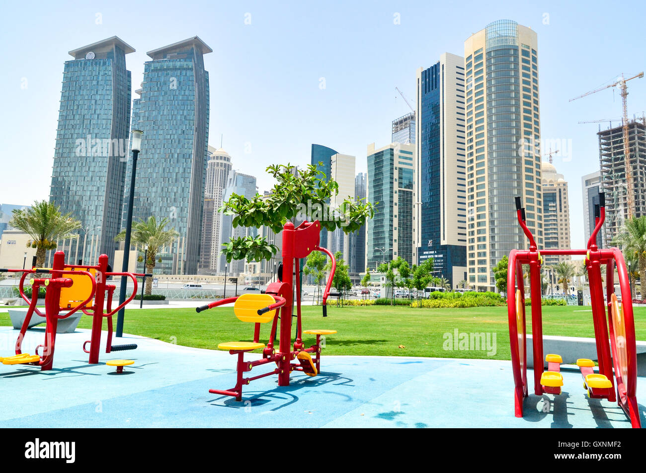 Public gym equipment in the middle of the West Bay financial district