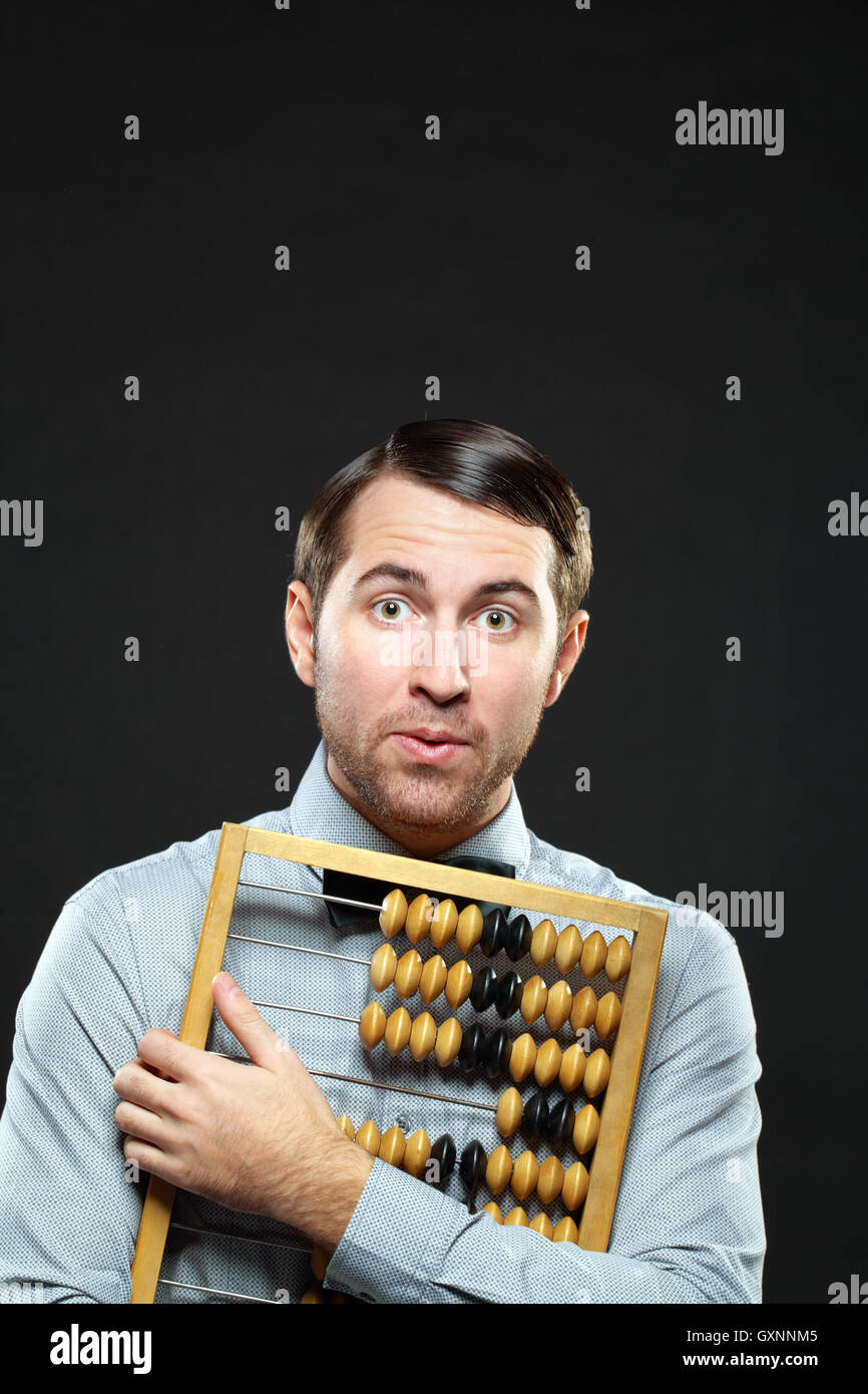 Man with abacus Stock Photo