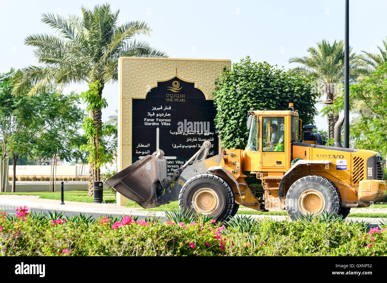 Wheel loader on the new roads of The Pearl-Qatar Stock Photo