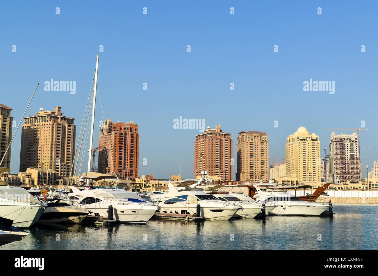 The Pearl-Qatar and yachts and boats in the Marina Stock Photo