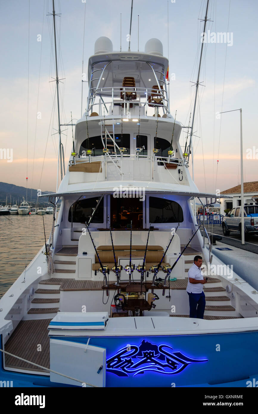 https://c8.alamy.com/comp/GXNRME/luxury-sports-fishing-boat-moored-in-marina-puerto-banus-marbella-GXNRME.jpg