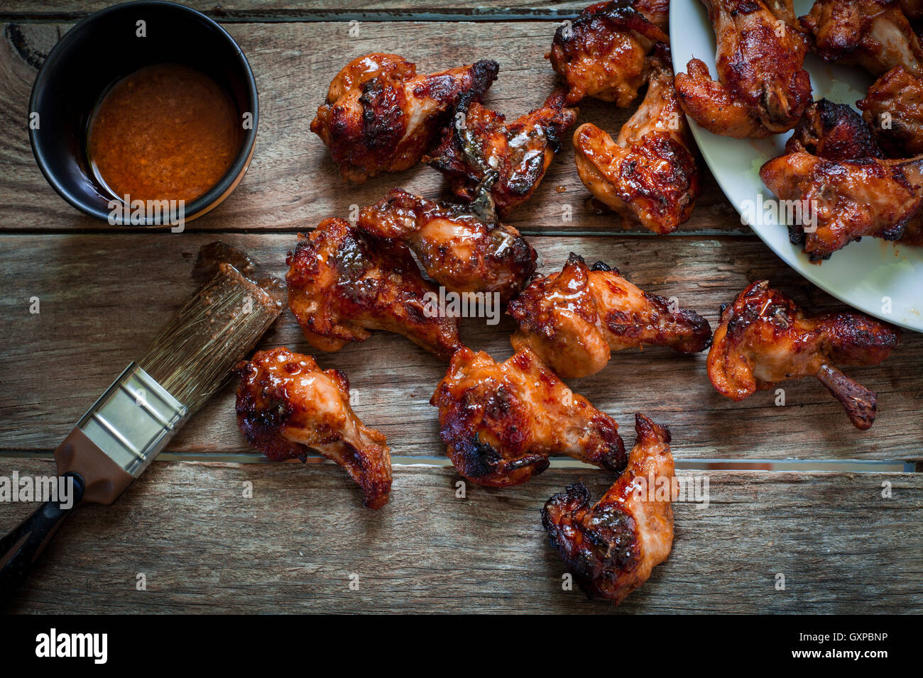 chicken wings with smoked bbq sauce for dip Stock Photo