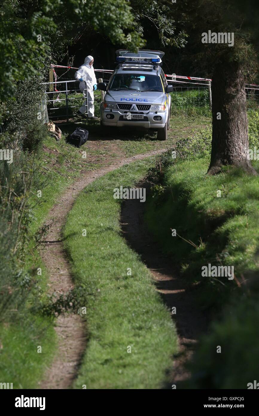 Forensics officers at farmland in Killen, around a mile from Castlederg, where new searches for Arlene Arkinson are underway. Stock Photo